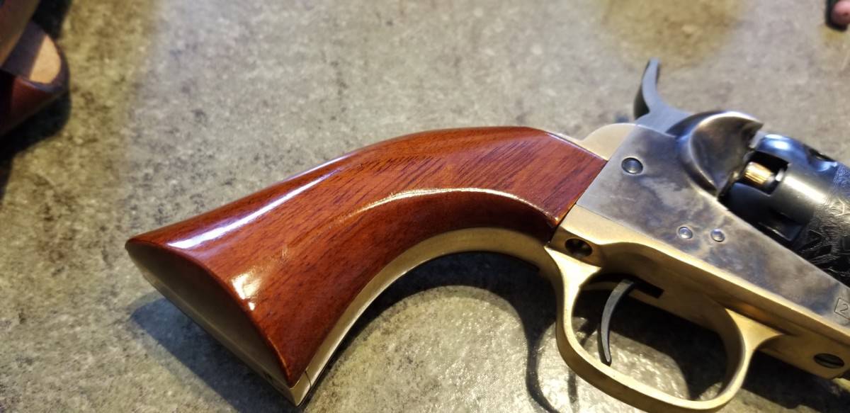 wooden grip, fit and finish of a uberti revolver
